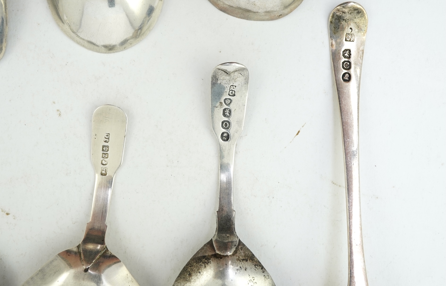 Ten assorted manly 19th century silver caddy spoons